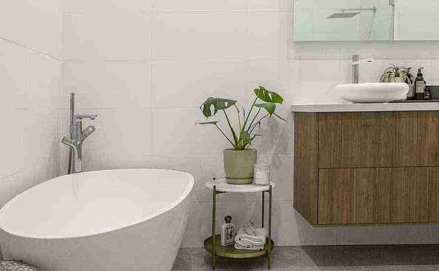 Fix the bathroom vanity to the wall.